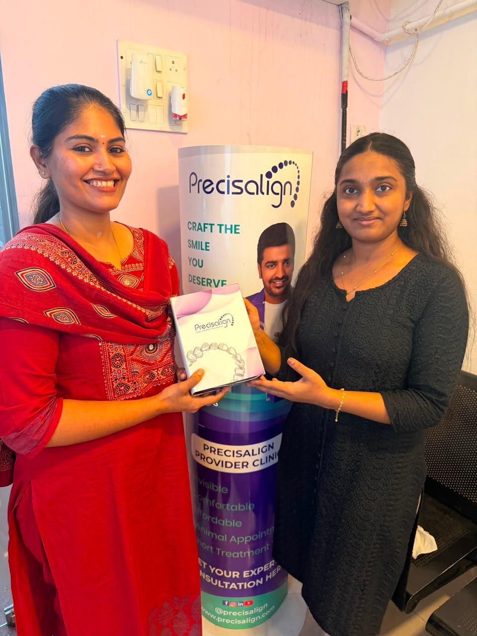 Patient receiving Precisalign clear aligner kit at Glodent Dental Clinic Chennai