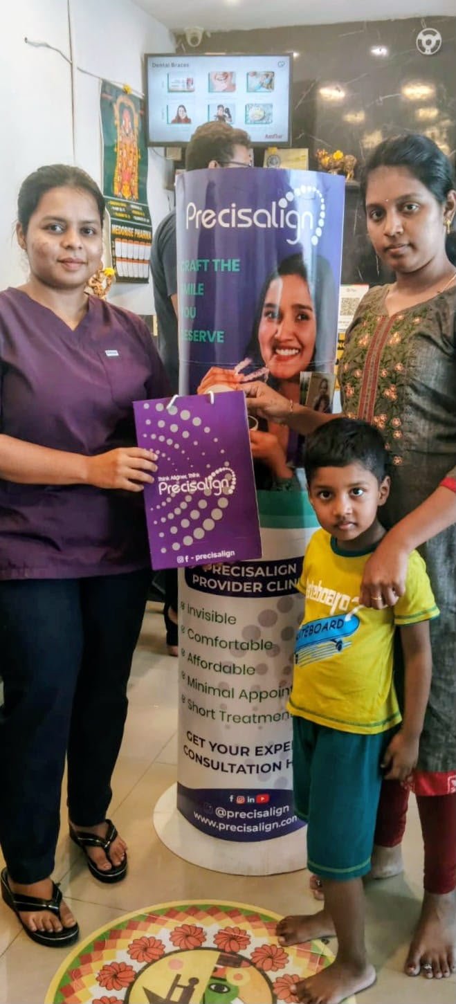 Family visiting Glodent Dental Clinic for Precisalign consultation in Chennai